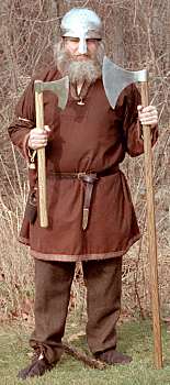 Image of Viking warrior holding axes used as weapons in battle